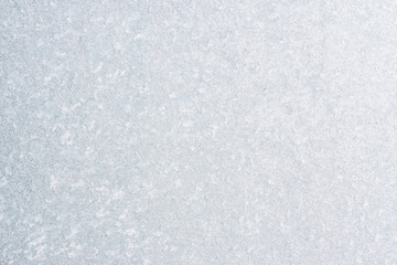 Winter background with gleaming ice. Frozen water texture. Copy space