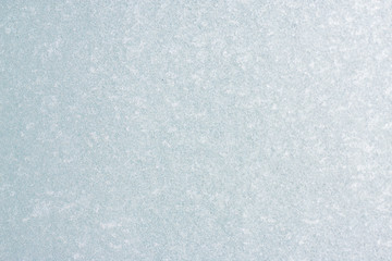 Ice background, frozen water with glass. Winter texture. Copy space.
