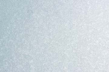 Ice background, frozen water with glass. Winter texture. Copy space.