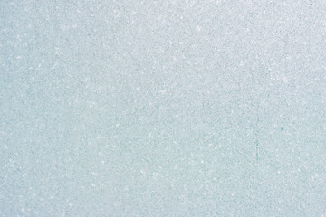 Ice background, frozen water with glass. Winter texture. Copy space.