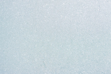 Ice background, frozen water with glass. Winter texture. Copy space.