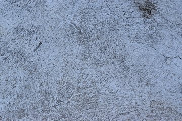 Grunge blue concrete wall with crack and stains in industrial building. Cement texture for design and background.