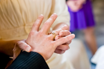 Putting on wedding rings