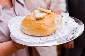 Bread and vodka for newlyweds before the wedding party