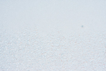 Frozen winter abstract background on the window glass with copy space