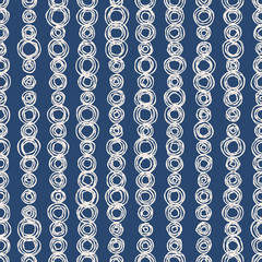 Geometric seamless pattern with hand drawn circles. Indigo background in sketchy minimal style. EPS10