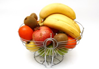 fruits in basket isolated on white