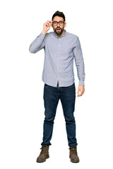 Fototapeta premium Full-length shot of Elegant man with shirt with glasses and surprised on isolated white background