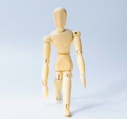 Wooden figure doll with prepare to start emotion for success business concept on white background