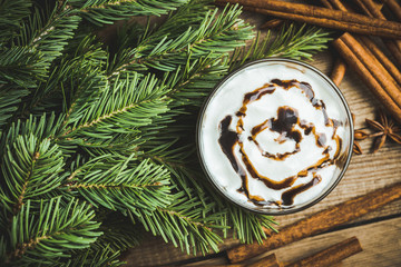 Sweet creamy latte on rustic background. Selective focus. Shallow depth of field.