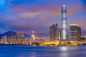 Hong Kong, China skyline of Kowloon across Victoria Harbor.