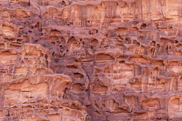 Melting stone texture, Close-up mountain surface texture in Wadi Rum desert, Jordan