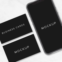 Mockup black smartphone and business cards vector
