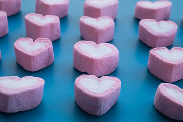 dessert Pink heart marshmallow on blue background