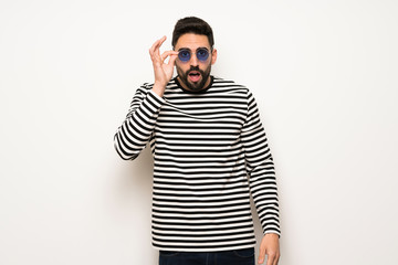 Obraz premium handsome man with striped shirt with glasses and surprised