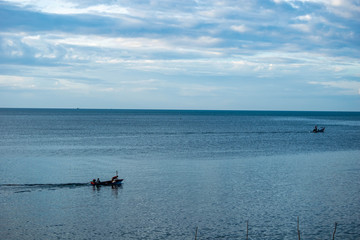Fototapeta premium Songkhla, Thailand - July 27, 2018 : The Smaill fishing boat are going out to fish