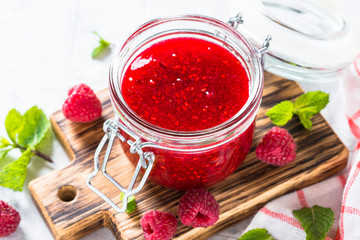 Strawberry jam in glass jar. 