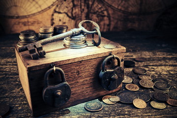 Treasure chest.Padlocks and keys.Old coins and money.Travel and marine engraving background.Pirate...