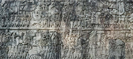 Bas-relief at  Bayon temple in Angkor Thom. Siem Reap. Cambodia. Panorama