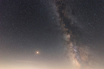 Milky way galaxy and mars planet. 