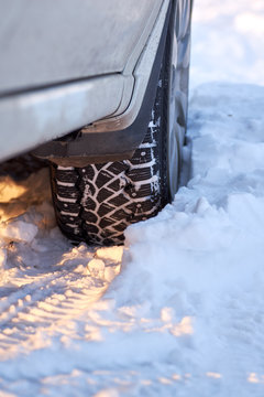 car wheel. winter tires. tread. track. security. snow.abstraction winter road