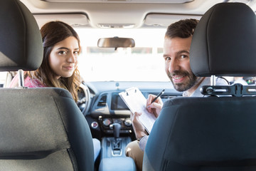 Woman And Instructor In Car During Test