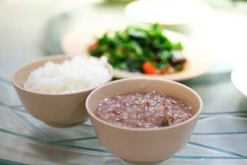 Asian rice porridge or soft boiled rice (white and brown rice)