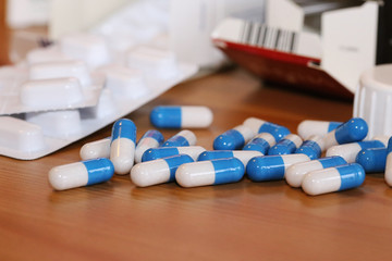 Close-up of different pharmaceutic pills, tablets and packages