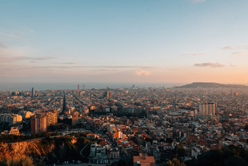 Sunset cityscape skyline view from Bunkers Del Carmel, in Barcelona, Spain