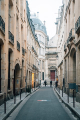 Fototapeta na wymiar A narrow street in Marais, Paris, France