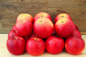 red apples on a wooden  background