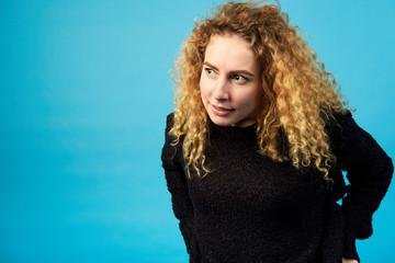 Fototapeta premium Young woman with curious facial expression.