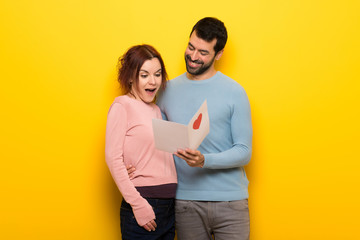 Fototapeta premium Couple in valentine day with valentines day card