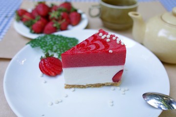 cheesecake with raspberries and whipped cream