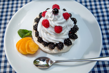 whipped cream with berries and strawberries