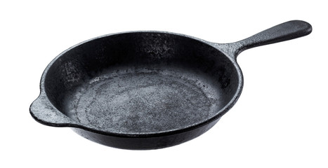 Old cast iron pan isolated on white background