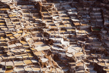 Historical salt mining pans of Maras in Peru