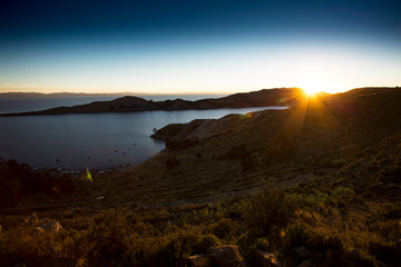Fototapeta na wymiar Sunset over Isla del Sol at the Titicaca lake in Bolivia/Peru