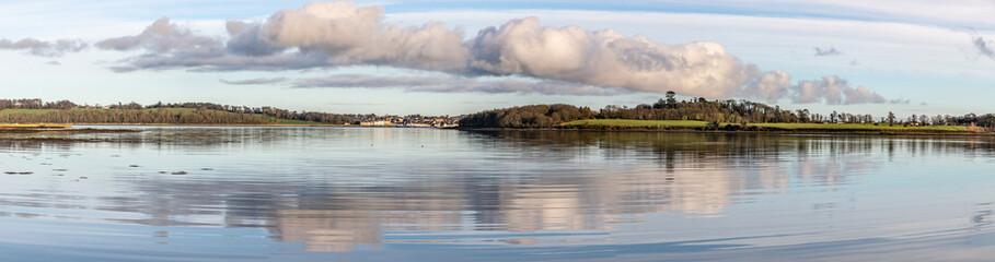 Panorama of Portaferry village and forest in Strangford lough at sunset