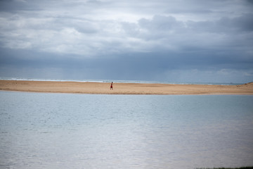 Man walking on beach 