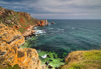 Beautiful landscape with blue sea and rocky shore