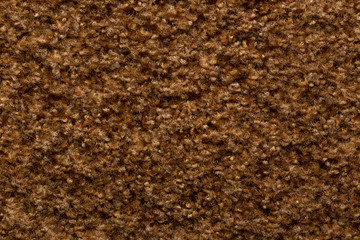 Dark brown textile texture, boucle, fluff surface.	
