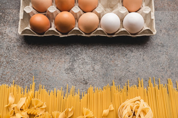 Different types of pasta that we use every day in the kitchen when cooking. View from above....