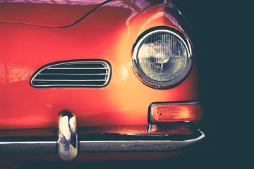 Foto op Plexiglas Voor hem Karmann Ghia oranje oldtimer op artistieke wijze tot in de details getoond