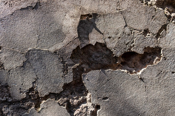 old stone wall with cracks