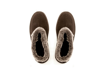 Brown sheepskin slippers isolated on white background	