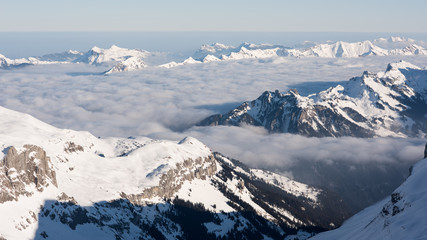 Alpine landscape on a wonderful cloud-free day in winter in the Swiss Alps, view from Schilthorn...