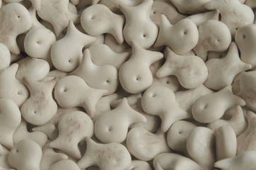 The background of the little cookies in the shape of a fish.
