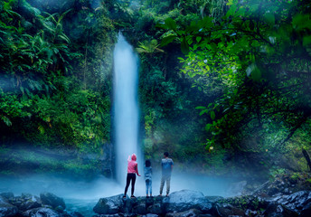 Children with mother enjoying Sawer waterfall view
