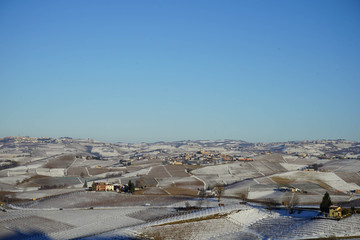The Langhe hills covered with snow in winter, Piedmont - Italy